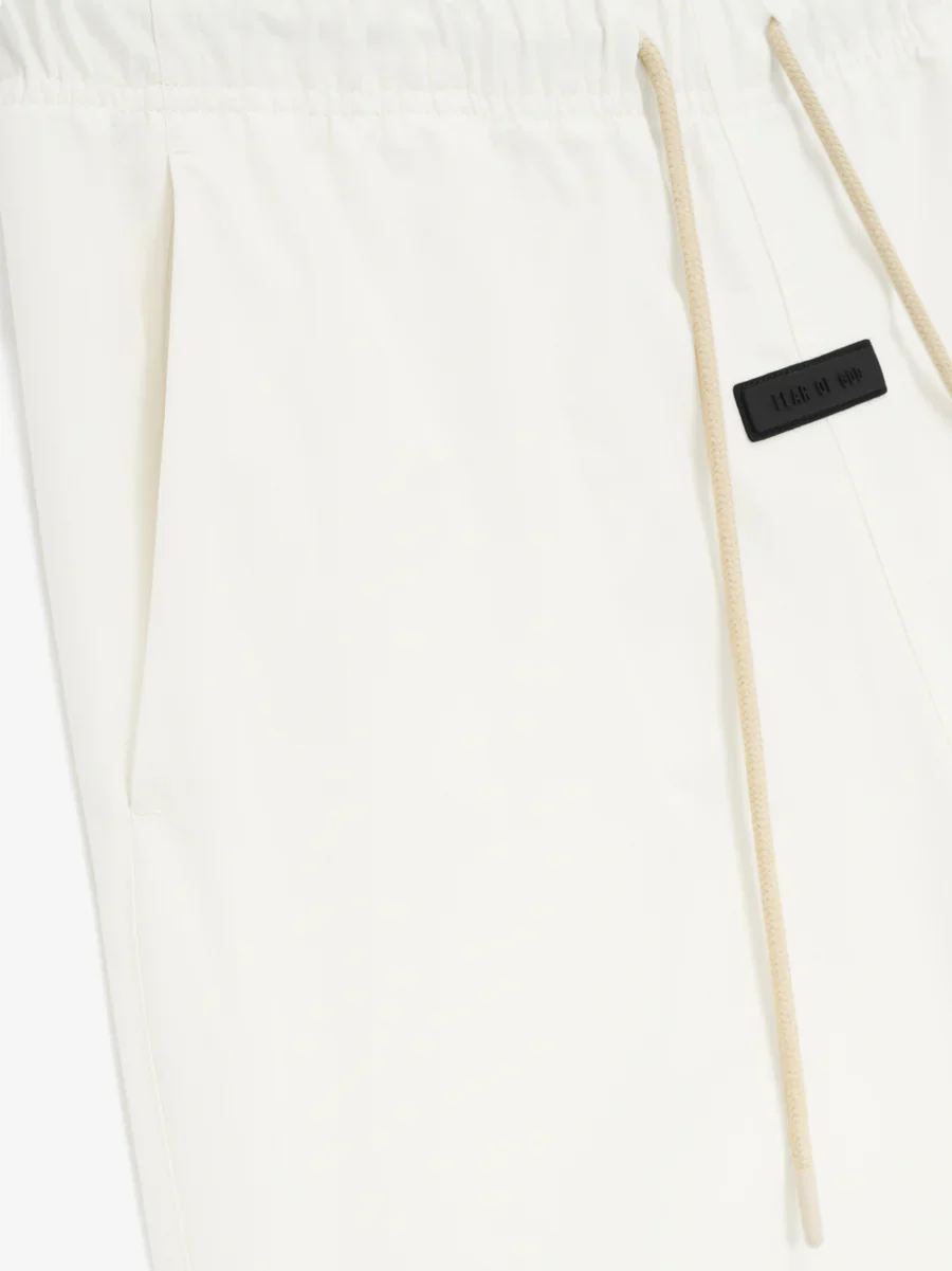 Fear of God Essentials Relaxed Trouser in Cloud Dancer - Image 4