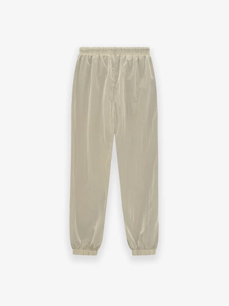 Fear of God Essentials Crinkle Nylon Trackpants in Garden Yellow - Image 2